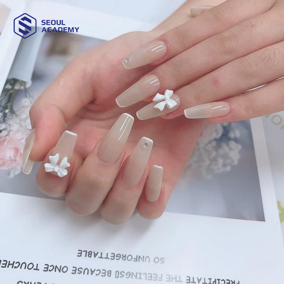 Kiểu nail đính nơ đẹp, đơn giản nhưng cực kỳ thu hút