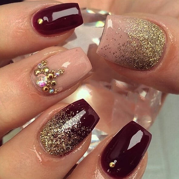 Plum nails with gold and stones