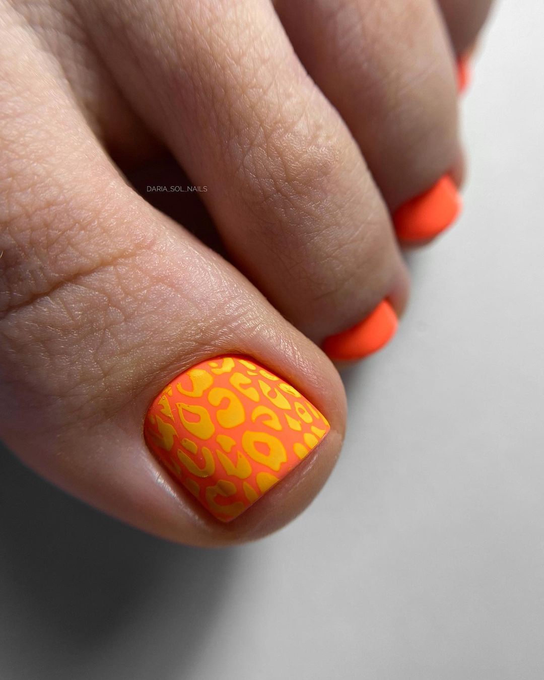 Bright Matte Orange Toe Nails