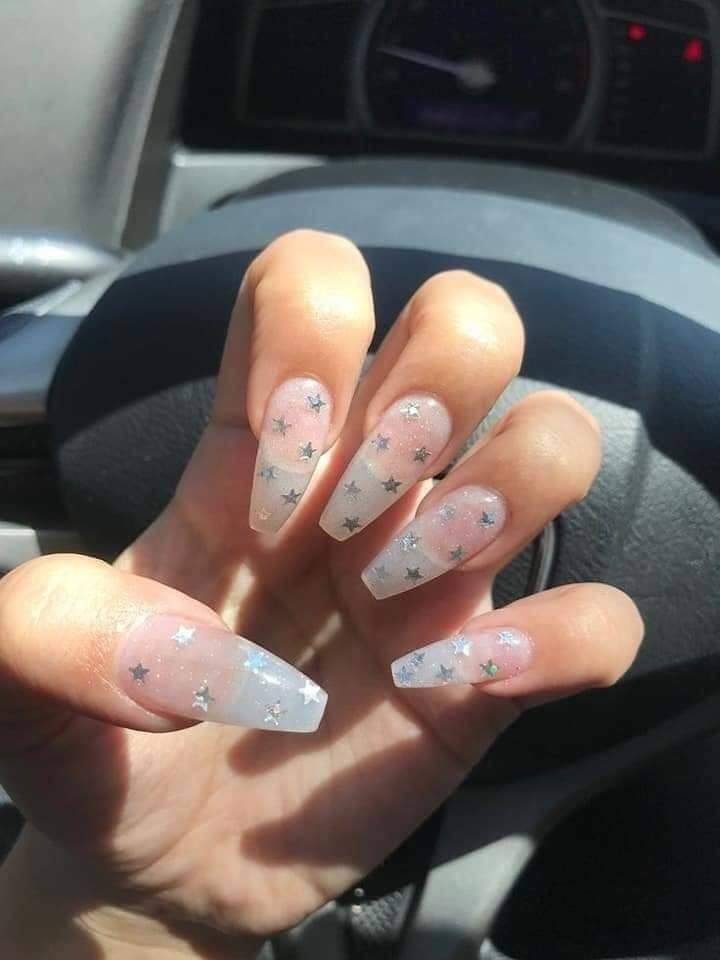 47 Nails with long ballerina stars nude enamel and silver stars of different sizes