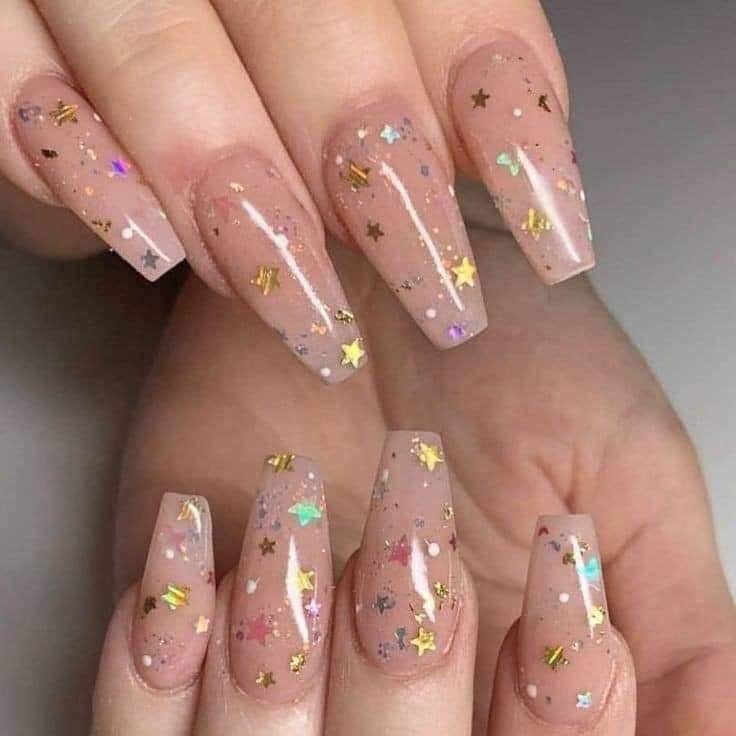 66 Nails with ballerina stars nude enamel with large and small colored stars