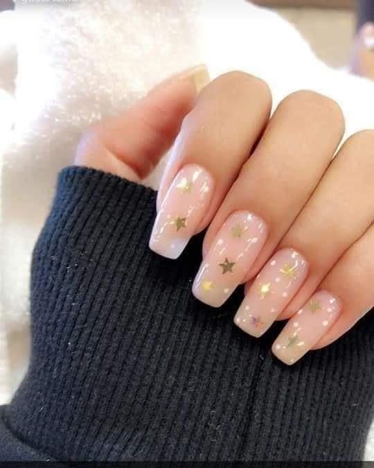76 Nails with acrylic semi-square stars with light beige enamel and gold stars
